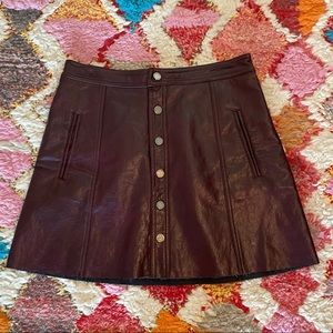 Blank NYC burgundy vegan leather skirt